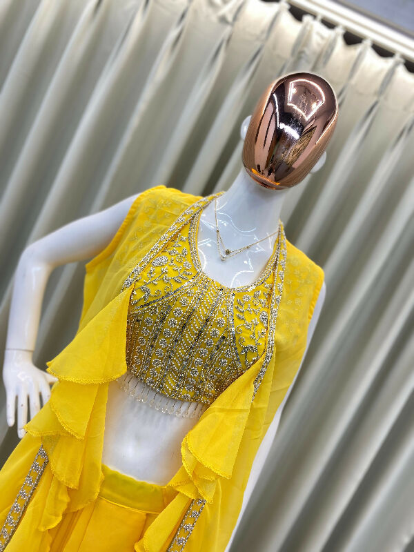 Yellow dhoti, skirt with top and cape jacket