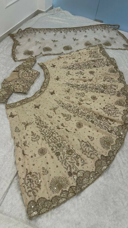 Ivory gold bridal lehenga with top and dupatta set