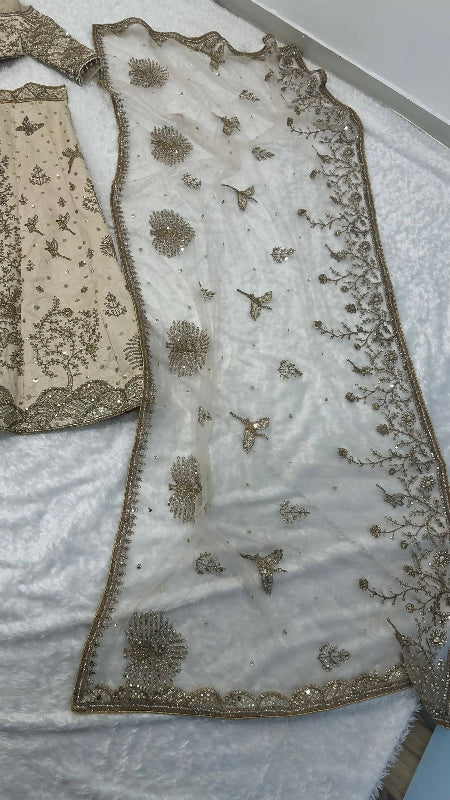 Ivory gold bridal lehenga with top and dupatta set