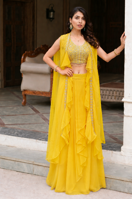 Yellow dhoti, skirt with top and cape jacket