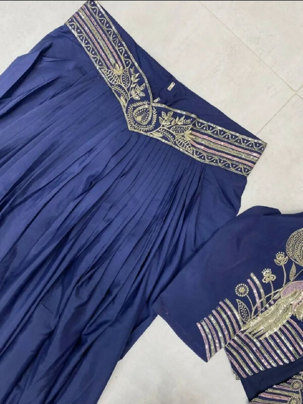 Blue indo western top with jacket and pleated skirt