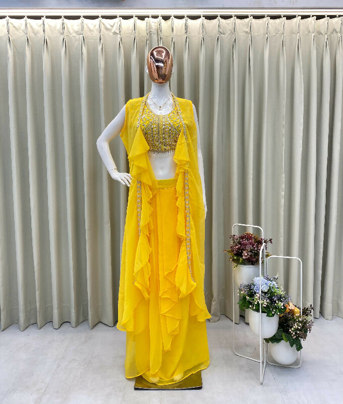 Yellow dhoti, skirt with top and cape jacket