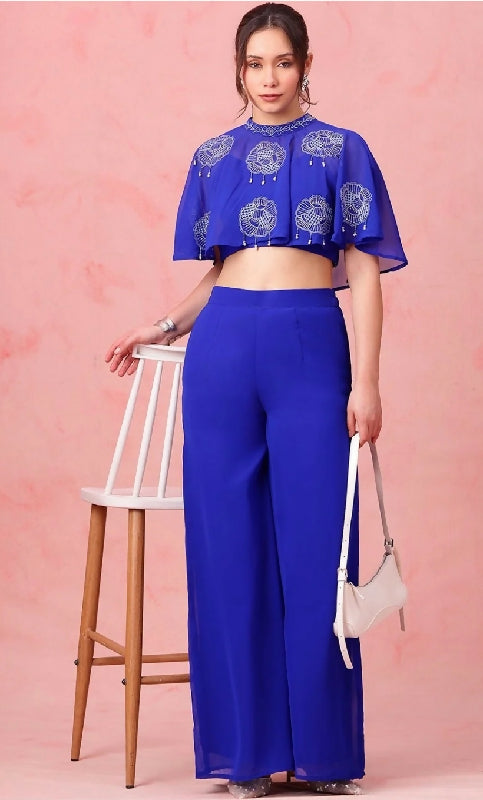 Blue spaghetti top with palazzo pents and poncho shrug set