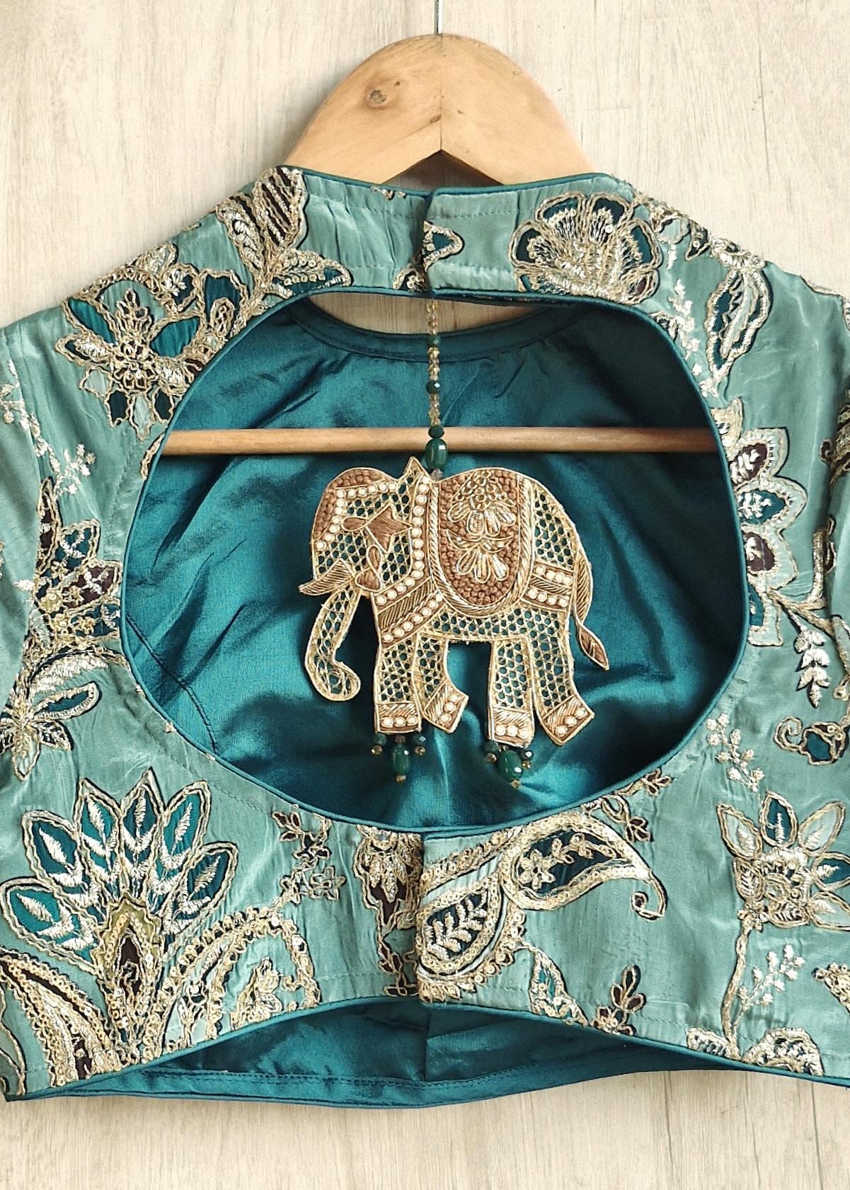 Green Embroidered Crepe Half Sleeves Blouse