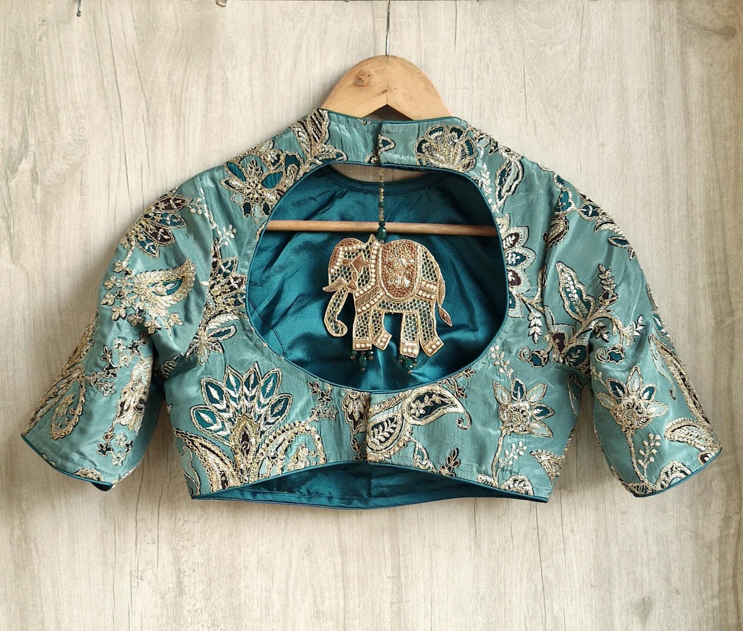 Green Embroidered Crepe Half Sleeves Blouse