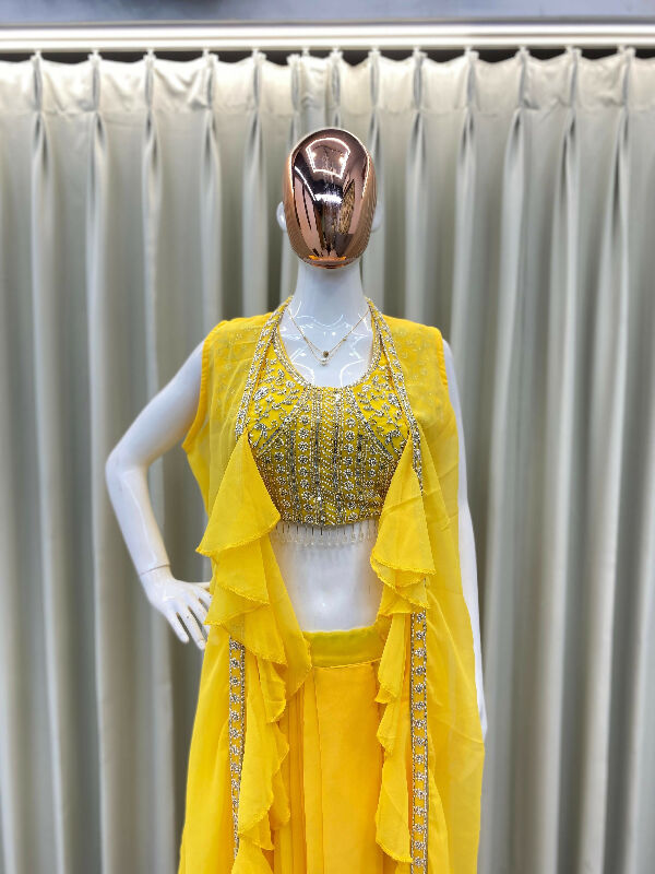 Yellow dhoti, skirt with top and cape jacket